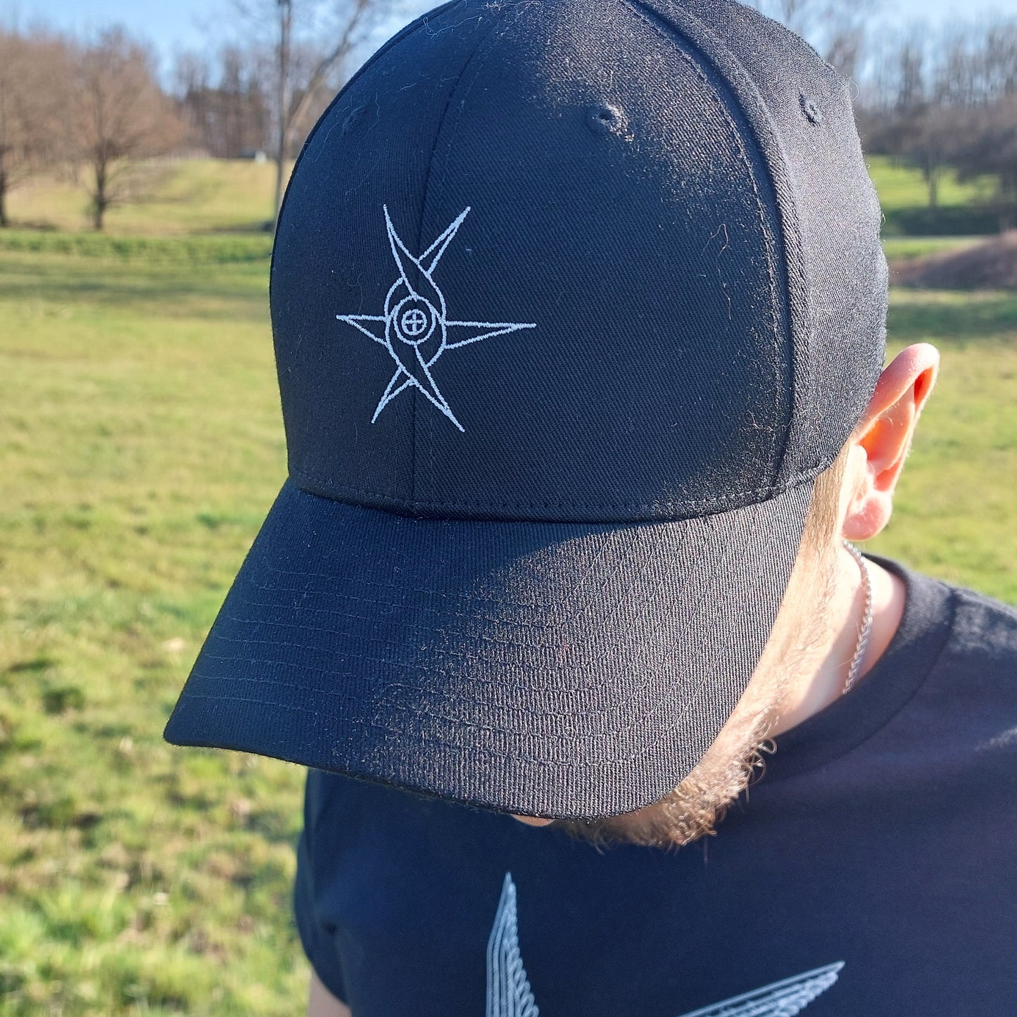 Angel glyph embroidered on classic cap